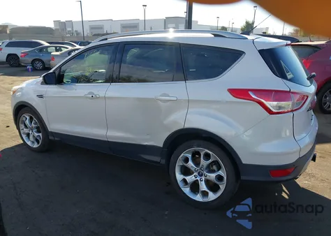 2014 Ford Escape Titanium z USA, uszkodzony, nr VIN 1FMCU9J92EUB16573
